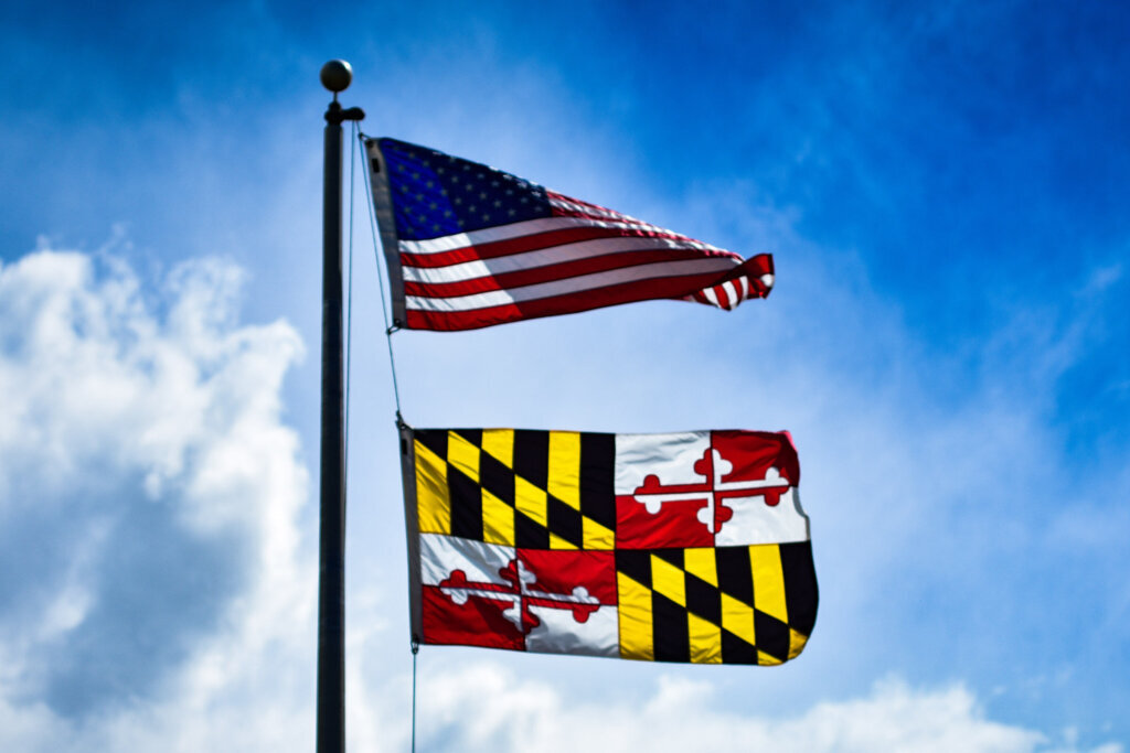 Maryland flag under American flag