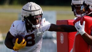 Commanders place Robinson Jr. on NFI list, sign Bostic, Mayo