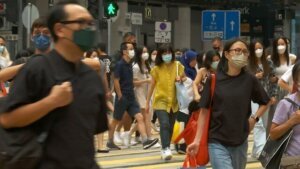 Strict COVID policies, political unrest prompt record exodus from Hong Kong