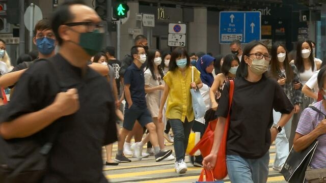 Strict COVID policies, political unrest prompt record exodus from Hong Kong