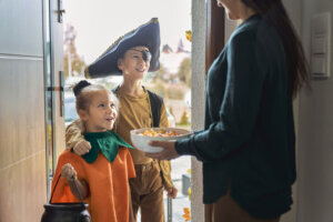 Children dressed in Halloween Costumes trick or treating