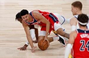 Davis juggling being new father and first NBA camp