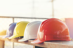 Banner Construction hard hat safety tools equipment for workers in construction site for engineering protection head standard. Panorama Many hard hat helmet on row copy space. Engineer Construction