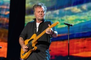 US ENTERTAINMENT MUSIC FARM AID