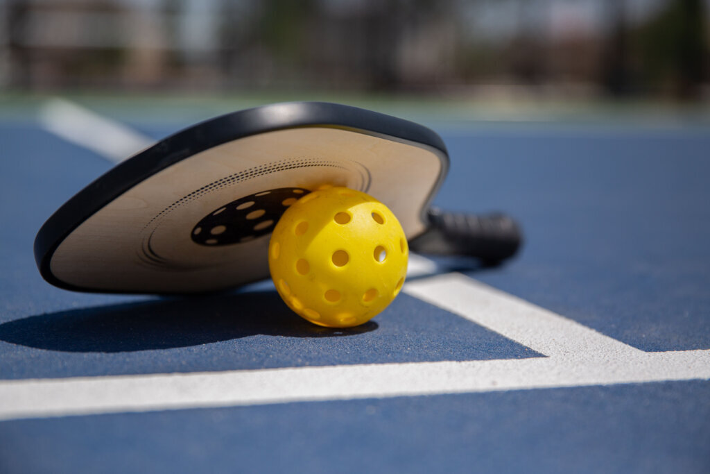 Boy playing pickle ball