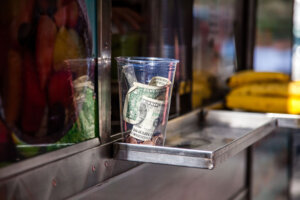 Tip jar at food cart