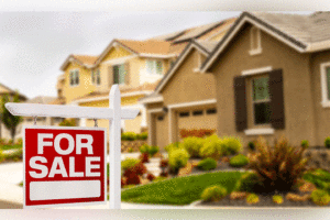 House with for sale sign