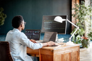 Programmer working with program code