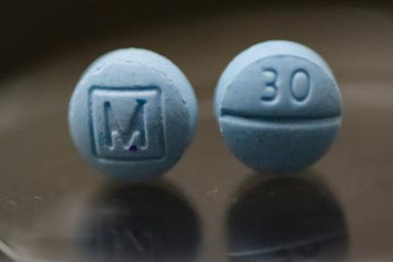 Counterfeit M30 oxycodone containing fentanyl (Courtesy DEA)