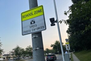 Sign for school zone speed camera.