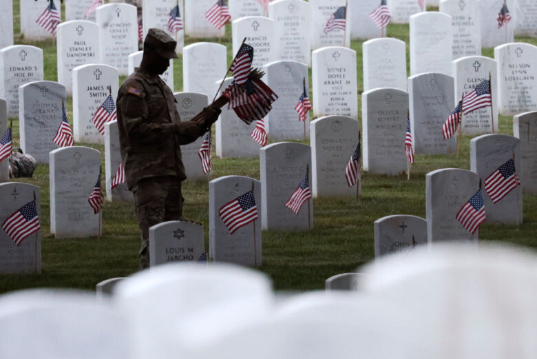 Annual Flags In Event Held At Arlington Cemetery Ahead Of Memorial Day
