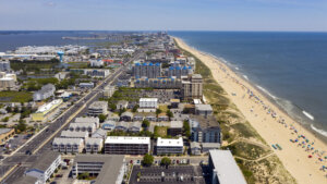 People Flock to the Beach on a 90 plus degree day in Ocean City Maryland
