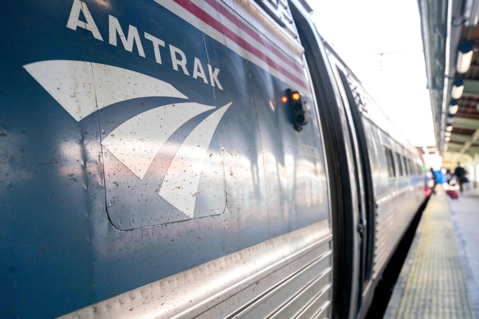 The Amtrak logo is seen on a trainv