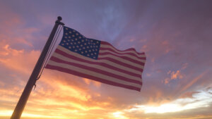American Flag on Flagpole by Evening Sunset Sky, USA