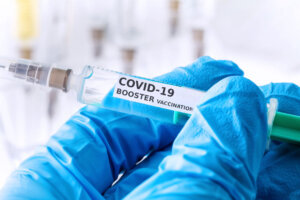 Covid 19 coronavirus booster vaccination concept