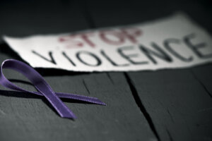 Purple ribbon against the violence against women
