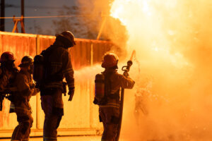 Firefighters Battling a Roaring Fire