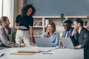 Two women and two men in business meeting