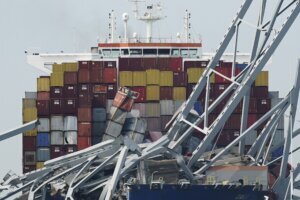 The container ship Dali is stuck under part of the Francis Scott Key Bridge