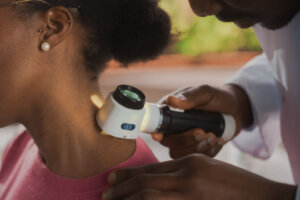 Black woman receiving a cancer screening