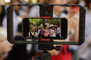 An iPhone records student rally