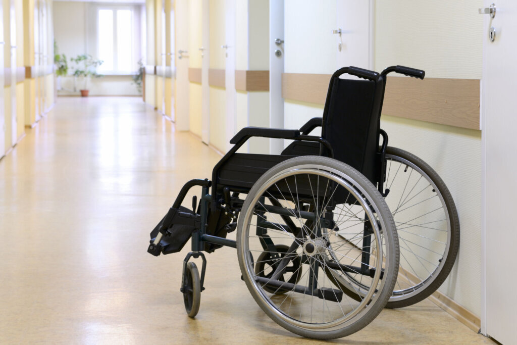 Wheel chair in the hospital corridor.