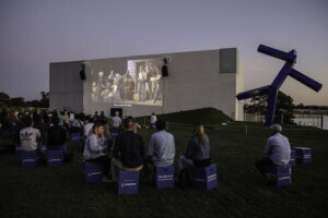 Patrons at Video Wall for Show Boat at Night with Blue 9.19.19 Photo by Jati Lindsay