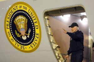 President Joe Biden walks down the steps of Air Force One.