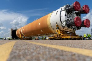 Portion of rocket being transported on the ground.