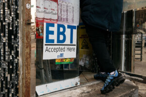 A sign alerting customers about SNAP food stamps benefits