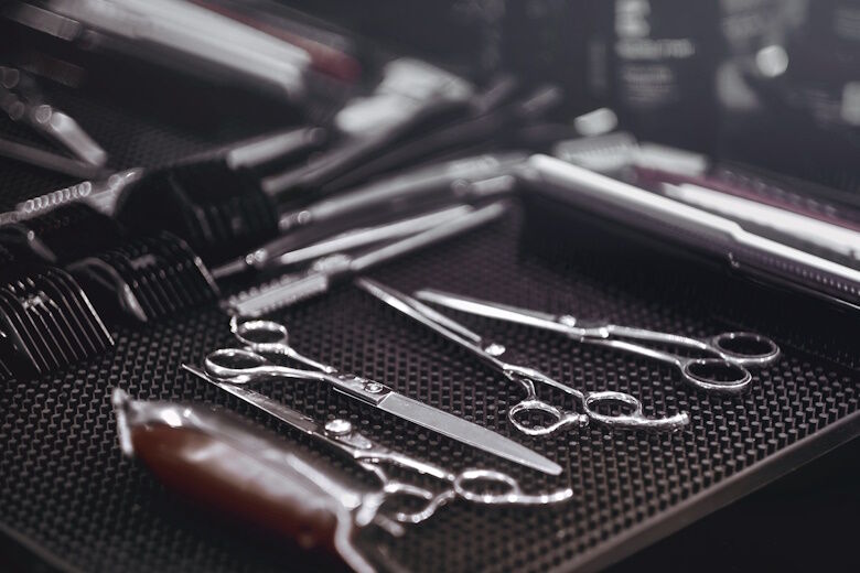 Professional barberian tools of hairdresser on table. Tools for cutting beard and hair barbershop.