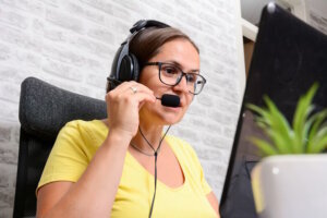 Call center operator with headphones