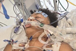Chase Lancaster seen in the hospital after being shot.