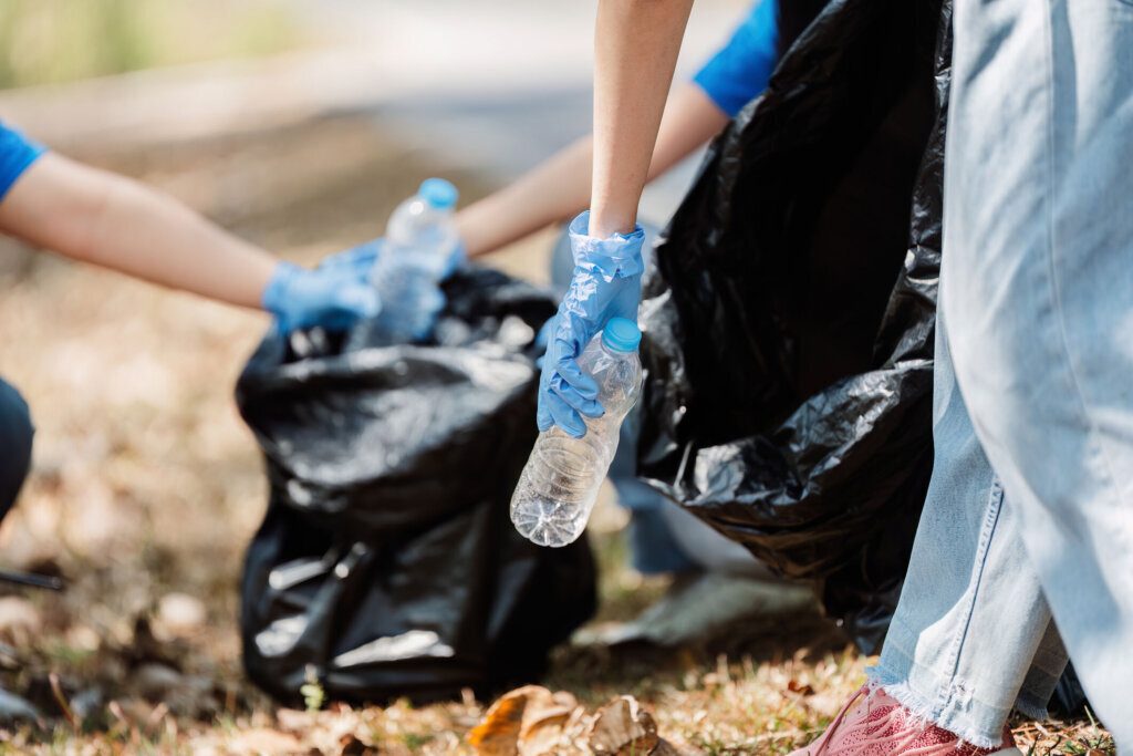 People collecting trash.