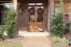 Shipping packages at front door during holiday shopping season