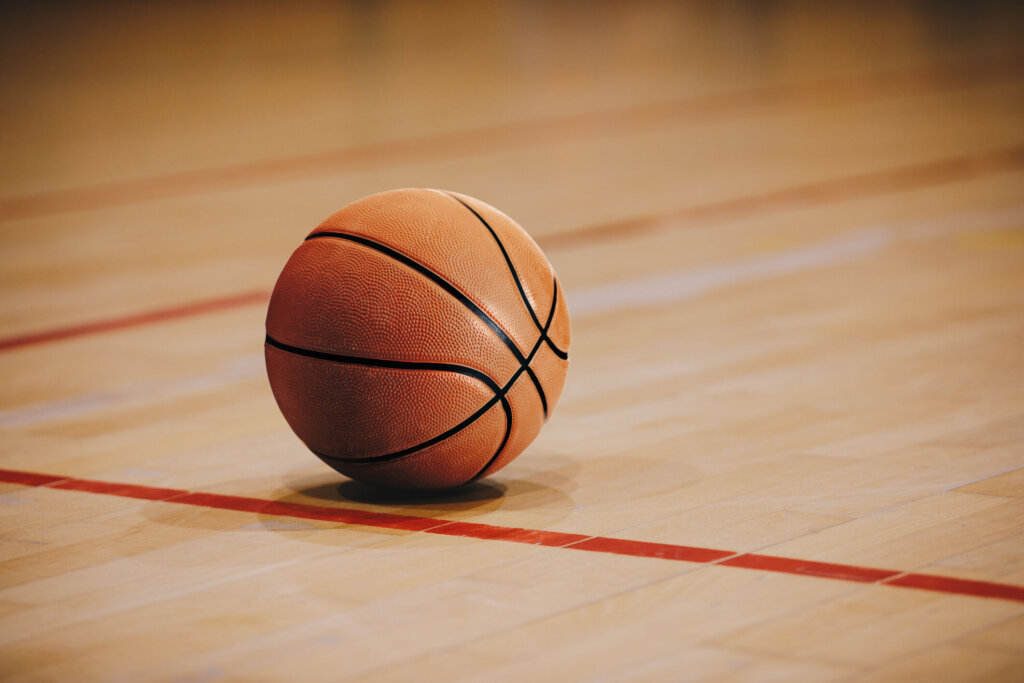 Basketball on wooden court