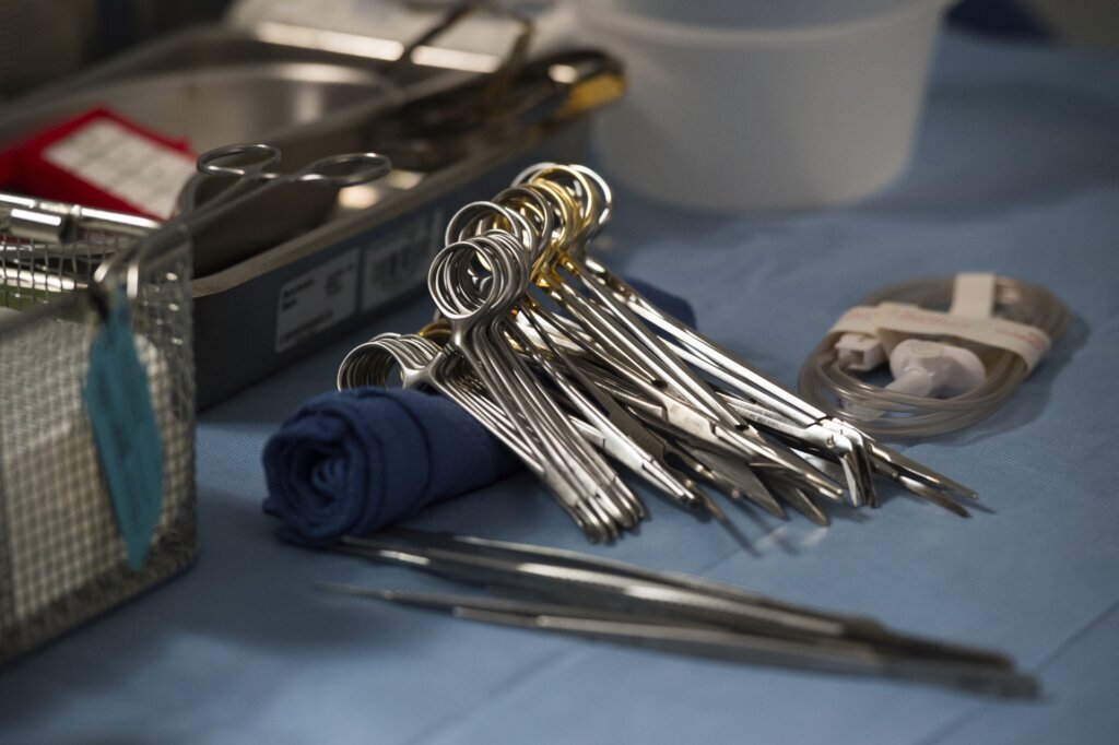 Surgical instruments and supplies lay on a table