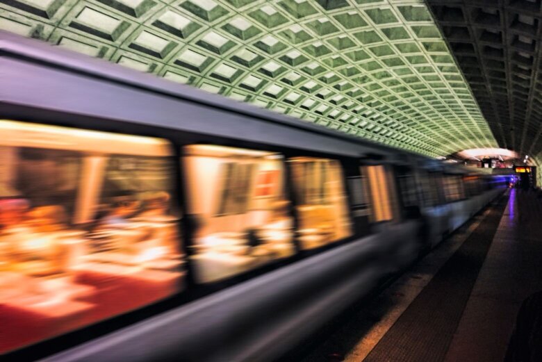 A train passes thru a Metro station