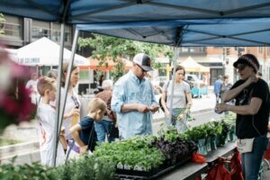 Family members at a farmer's market.
