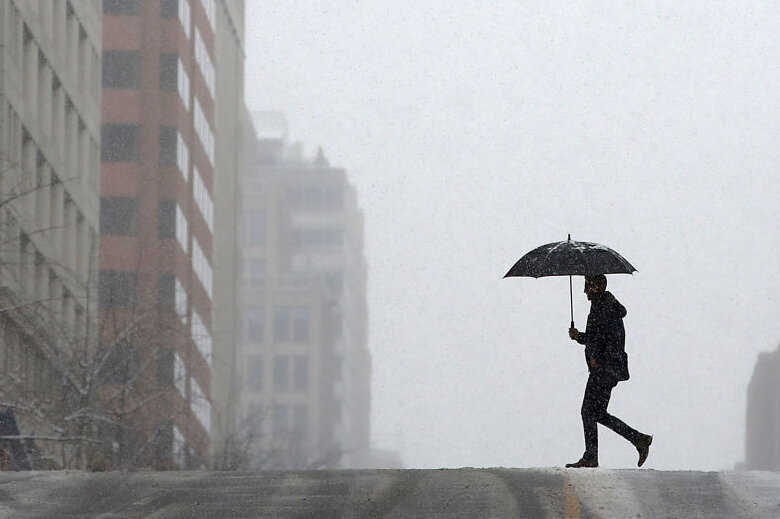 Wintery Mix Of Snow, Ice, And Rain Falls In Washington D.C. Area