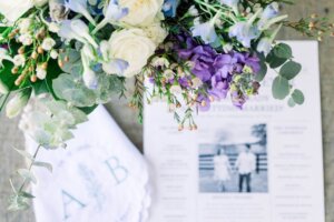 A flat lay photo of details from Amanda Kraemer's summer 2024 wedding in Northern Virginia