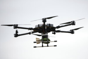 A drone carrying a bomb flies over during joint Russian Belarusian military drills