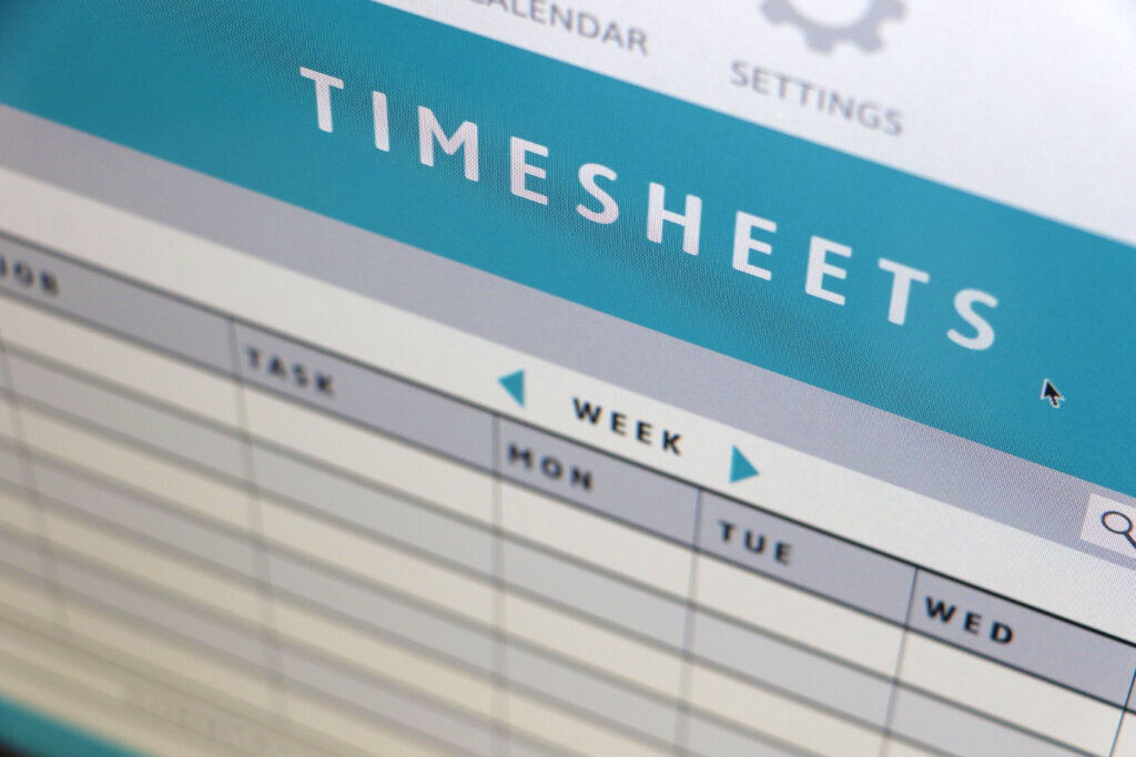 Generic digital designed time sheet on computer screen for tracking business trading hours