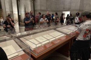 Visitors seeing the Constitution on display