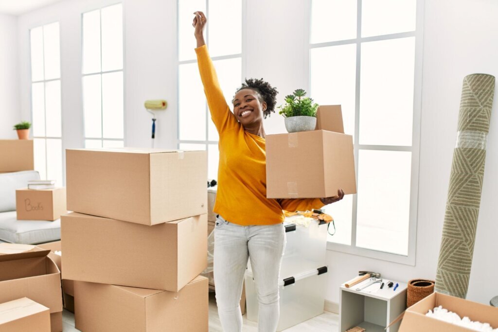 WOMAN BUYS HOME