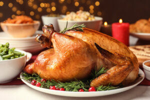 A roasted turkey on a table.
