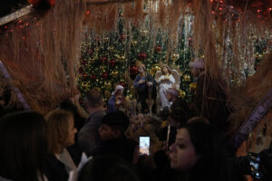 Palestinians take part in Christmas tree–lighting event