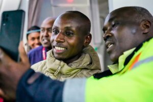 CORRECTION Kenya Marathon Record Breaker