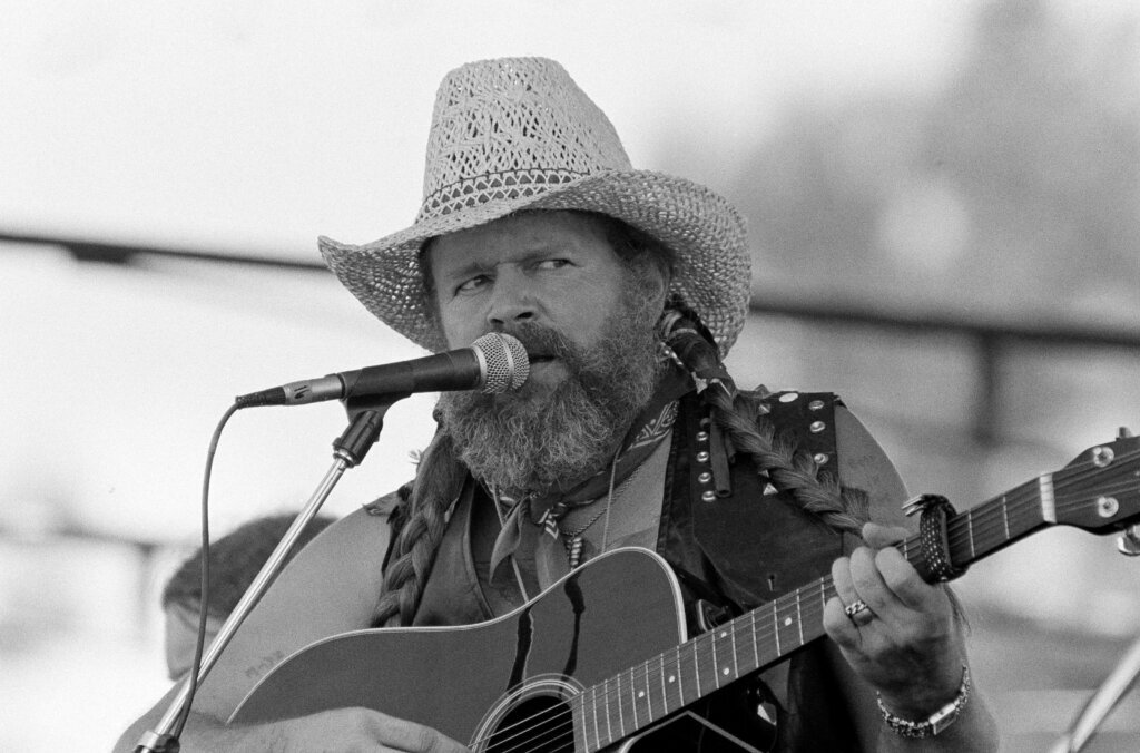 FILE - David Allan Coe, sporting Willie Nelson braids, performs at the Willie Nelson July 4th Picnic, on July 4, 1983 at Atlanta International Raceway in Hampton, Ga. (AP Photo/Rudolph Faircloth, File)

&nbsp;