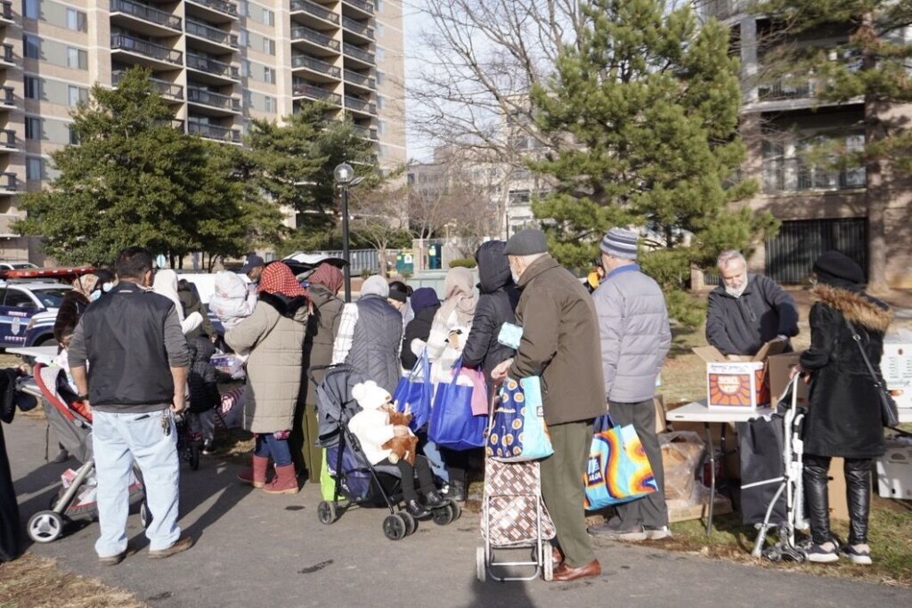 People lined up for assistance